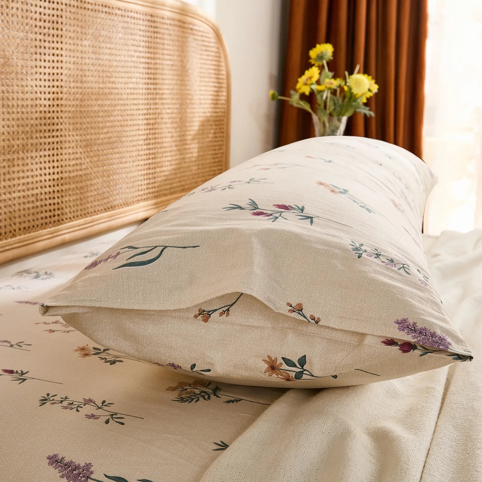 Side view of the cotton body pillowcase, highlighting the envelope closure and detailed wildflower print near the seam.