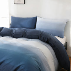 Drift into the depths of dreams with our ocean gradient duvet cover. It captures the serene transition from the mysterious dark blue of the abyss to the soft