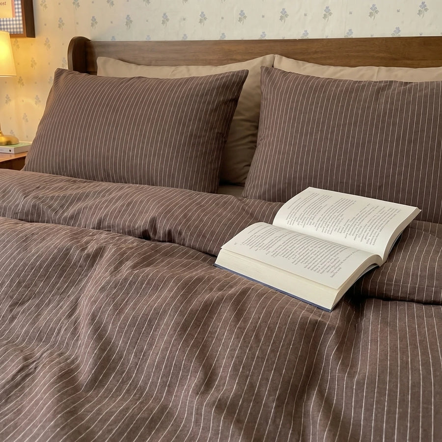 aesthetic dark earth tone striped bedding minimalist scandi style