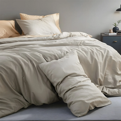 Front close-up of beige grey duvet cover with four pillows arrangement