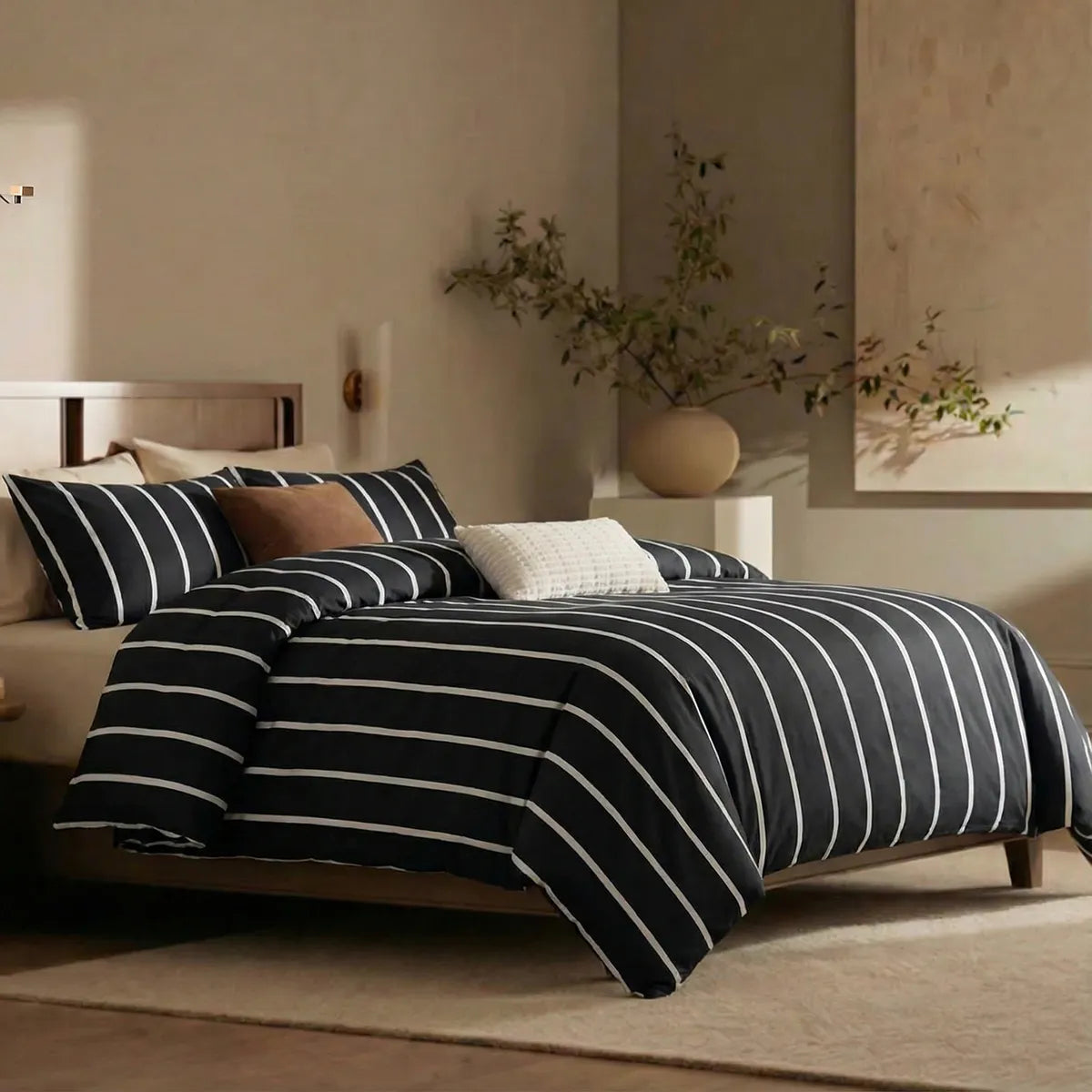 Angled shot of black striped duvet cover on bed
