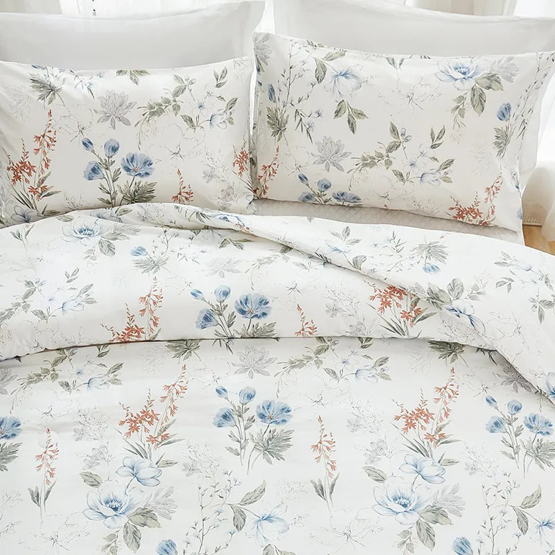 Closeup of the blue floral pillowcases with a matching comforter set