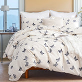 Full view of the butterfly duvet cover set styled on a bed in a bedroom.