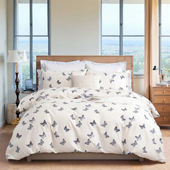 The butterfly duvet cover set on a bed, showing the matching pillows