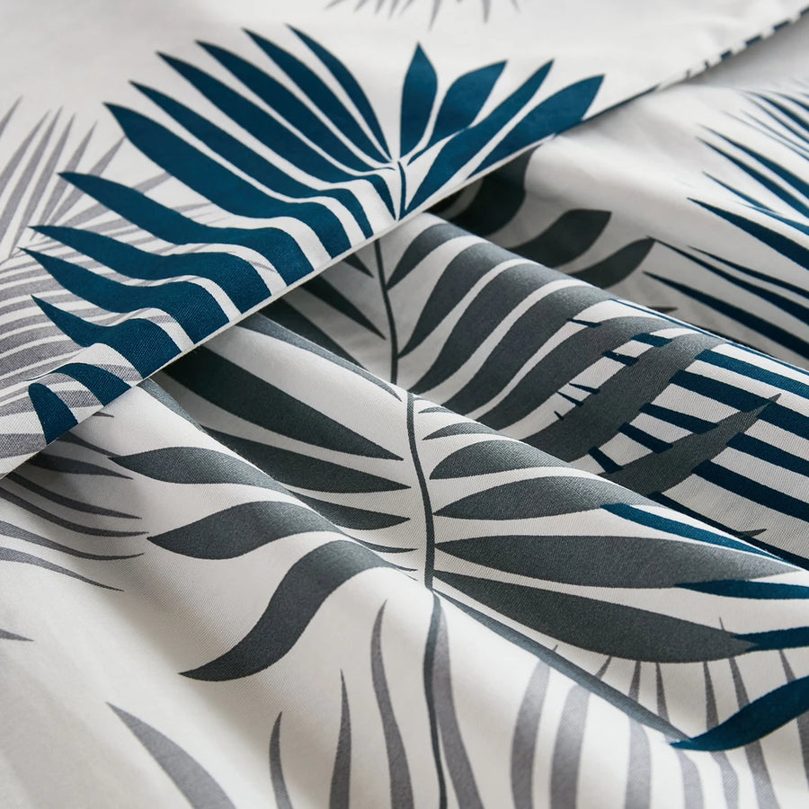 coastal navy charcoal palm fabric tropical flat lay