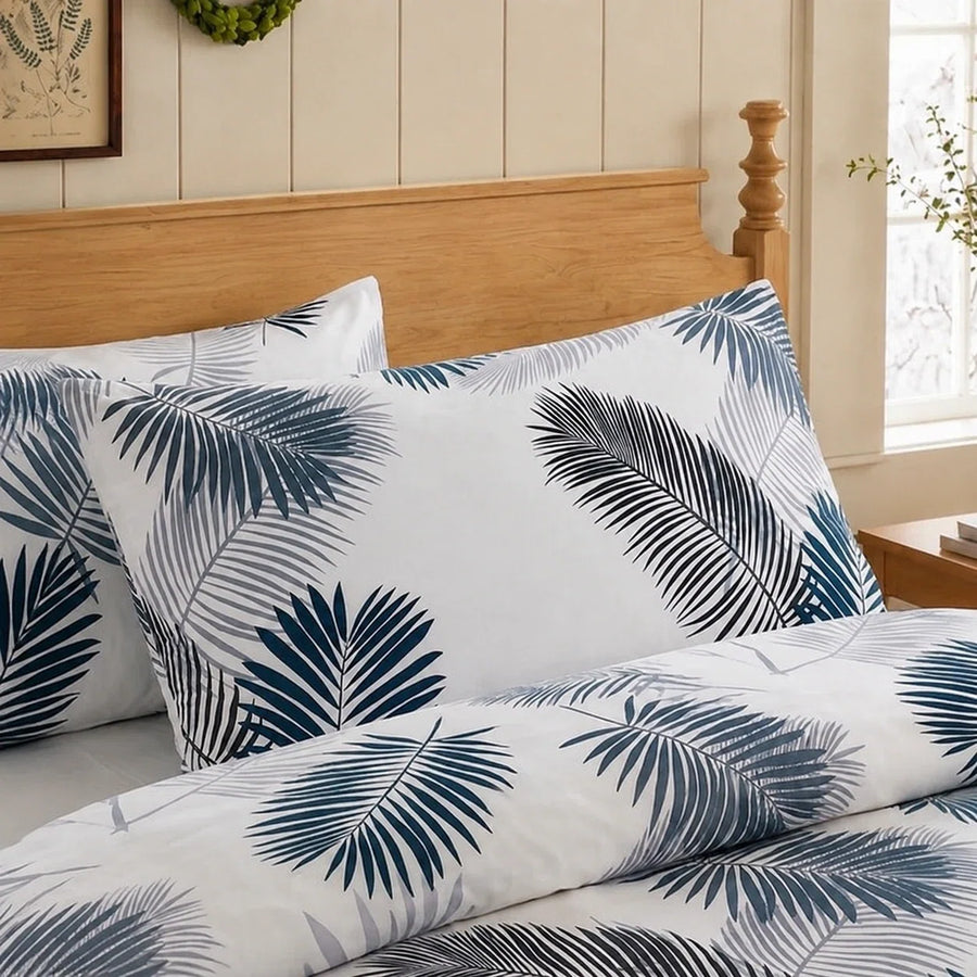 coastal navy charcoal palm pillowcases wooden bedframe styling
