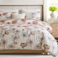 Close-up shot of the comforter showing the detailed wildflower pattern