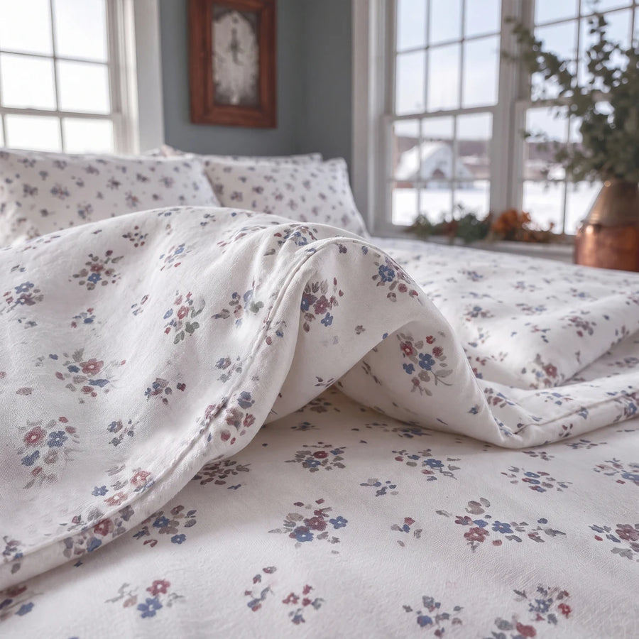 country breeze ditsy floral duvet cover set ivory dusty blue rose draped detail winter bedroom