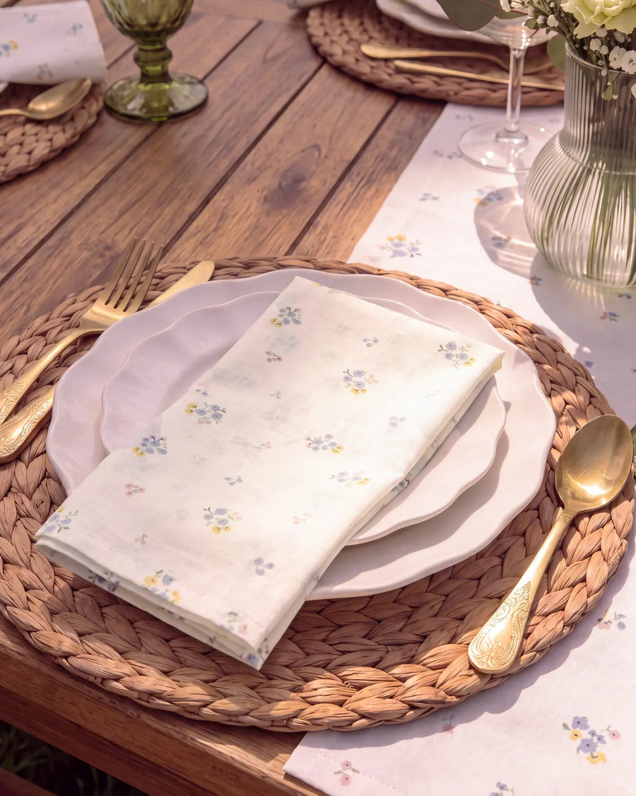 dainty wildflower cloth napkin folded plate