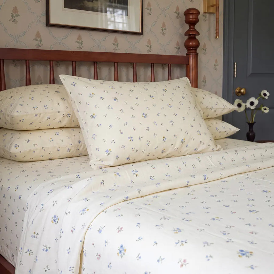 dainty wildflower meadow cotton sheets wooden nightstand