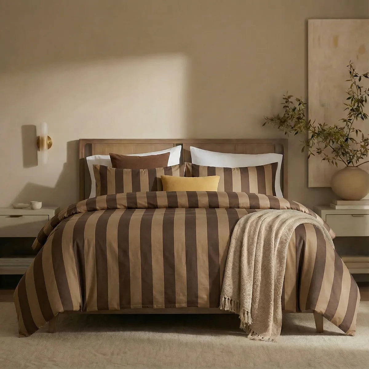 Full front view of dark and light brown striped bedding set