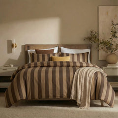 Full front view of dark and light brown striped bedding set