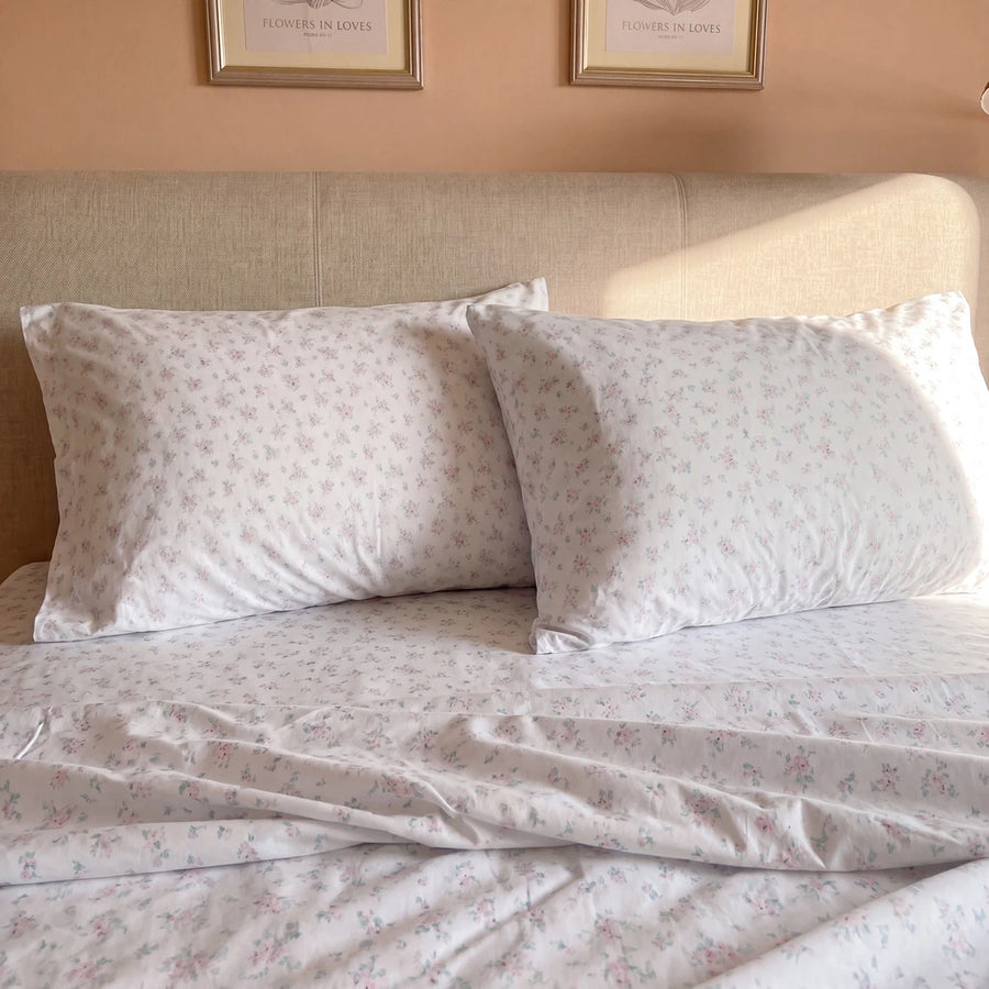 dreamy pastel sheet set warm toned bedroom scene