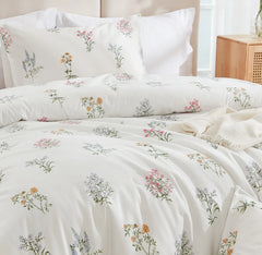 A detailed shot of the fabric texture of the floral duvet cover