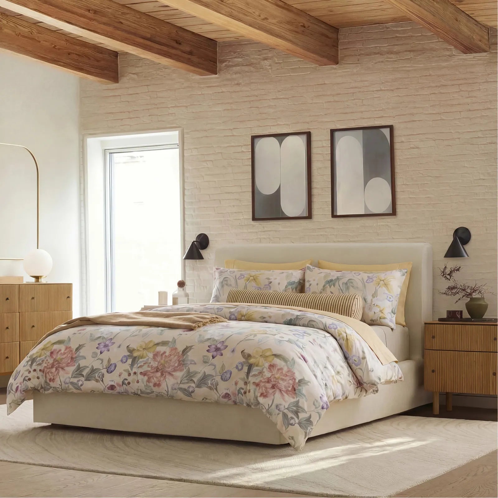 Lifestyle shot of a floral pattern comforter set in a modern rustic bedroom