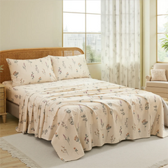 Full room view of cotton wildflower sheet set with pink and yellow flowers by large window