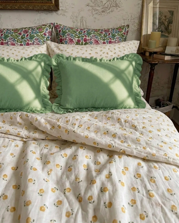 golden ditsy floral duvet cover set bedroom scene green ruffle pillows