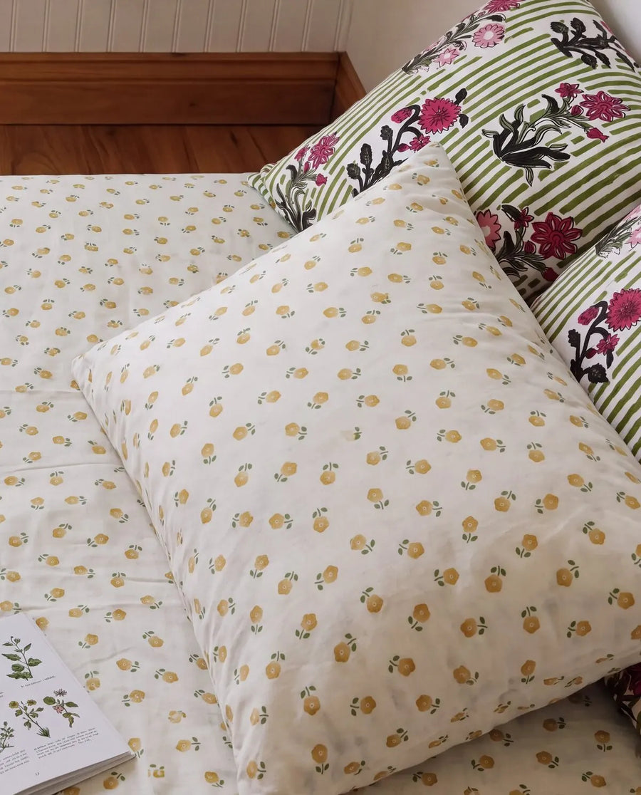 golden ditsy floral pillowcases botanical bedding styling