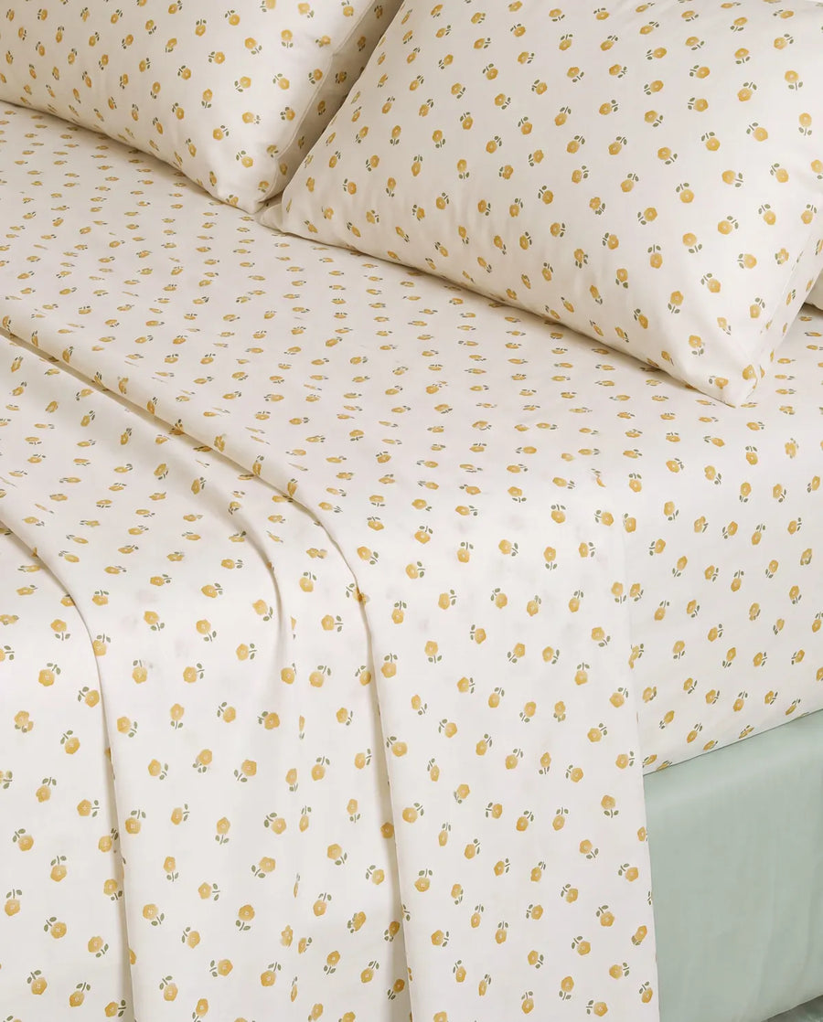 golden ditsy floral sheet set floral pattern closeup