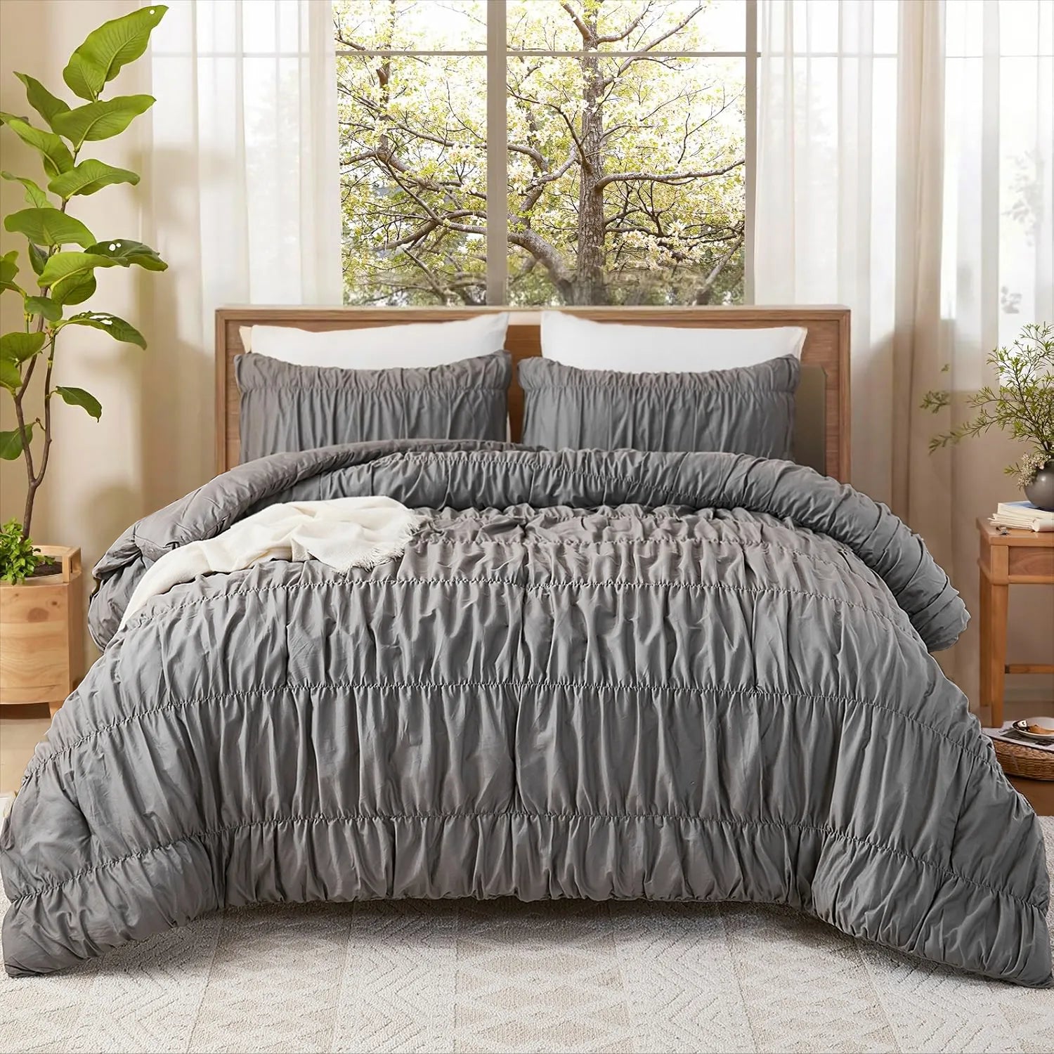 Gray crinkle cotton comforter front view with pillows