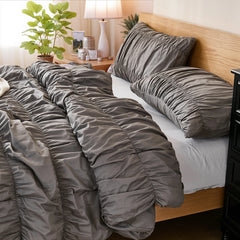 Gray crinkle cotton comforter headboard closeup