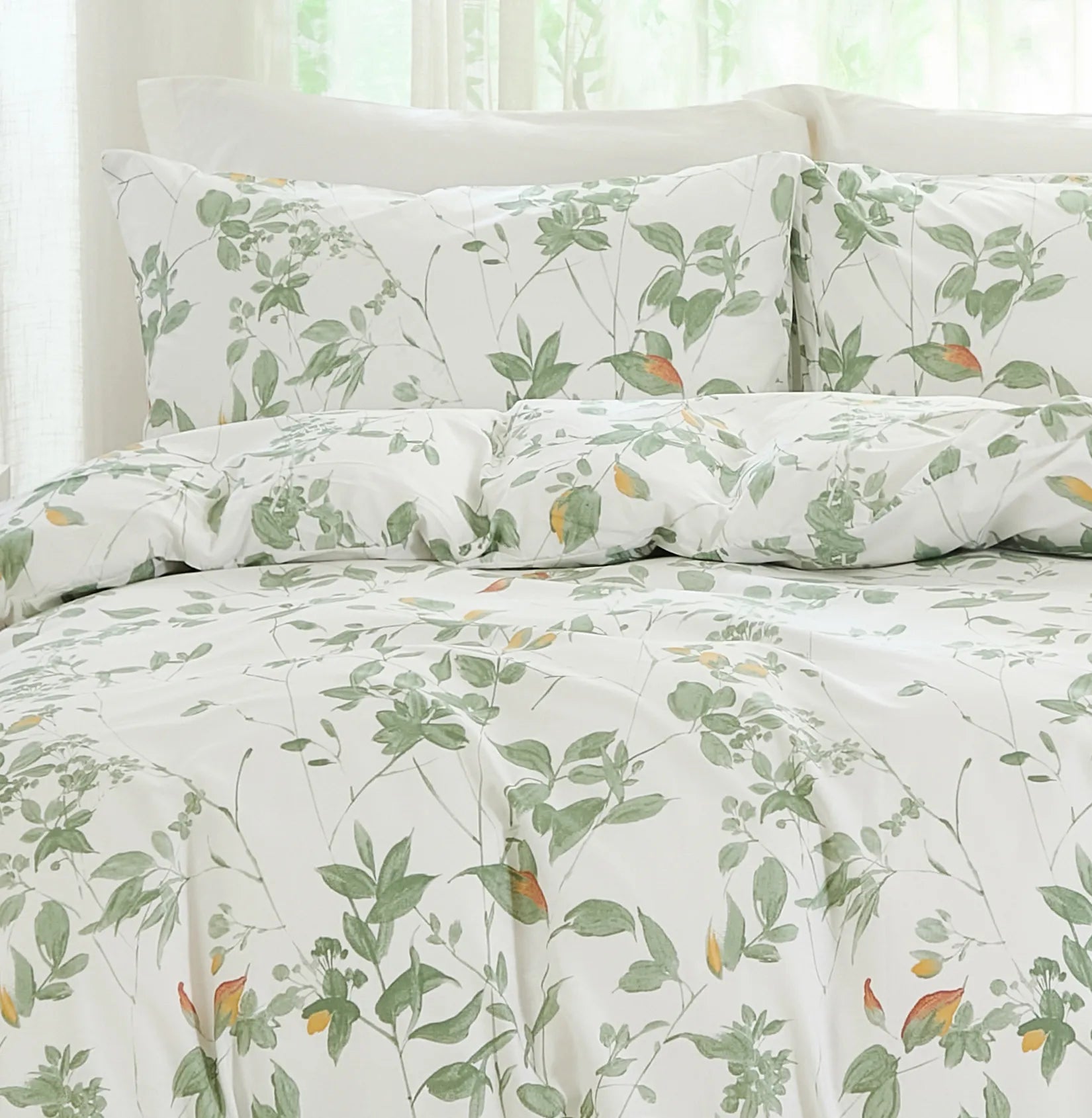 Close-up of the matching pillows from the green leaf comforter set