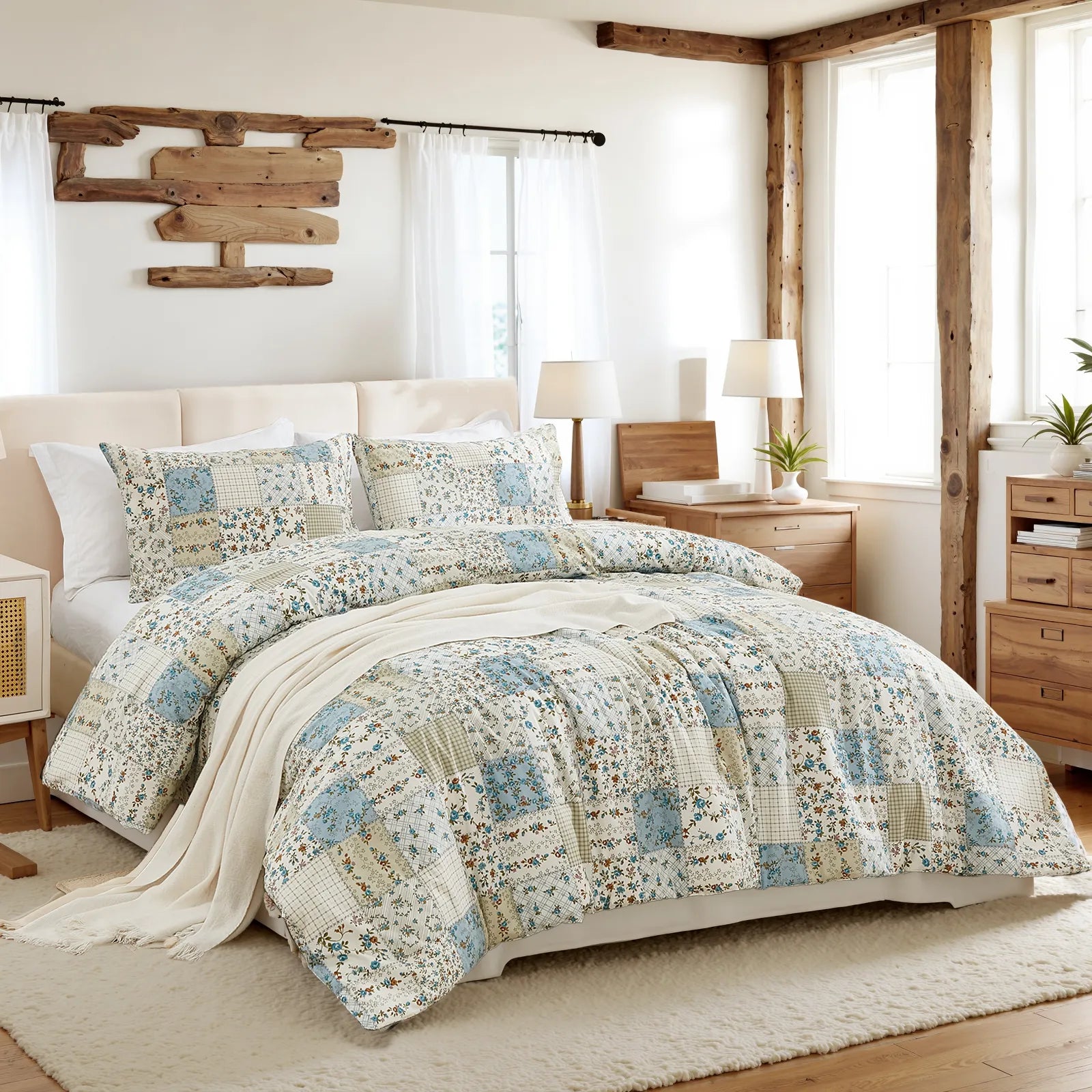 side view of the green patchwork comforter set on the bed, showing its thickness