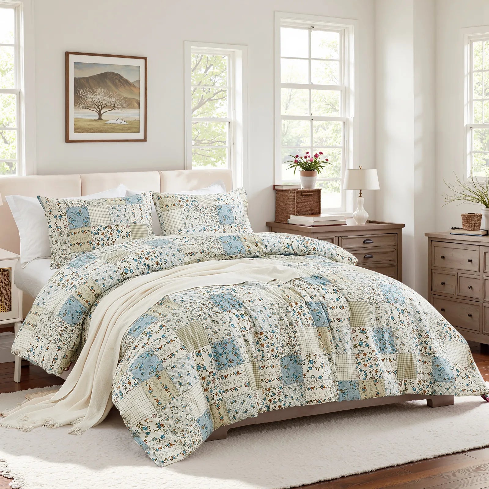 Full view of the green patchwork duvet cover set on a bed in a light-filled bedroom