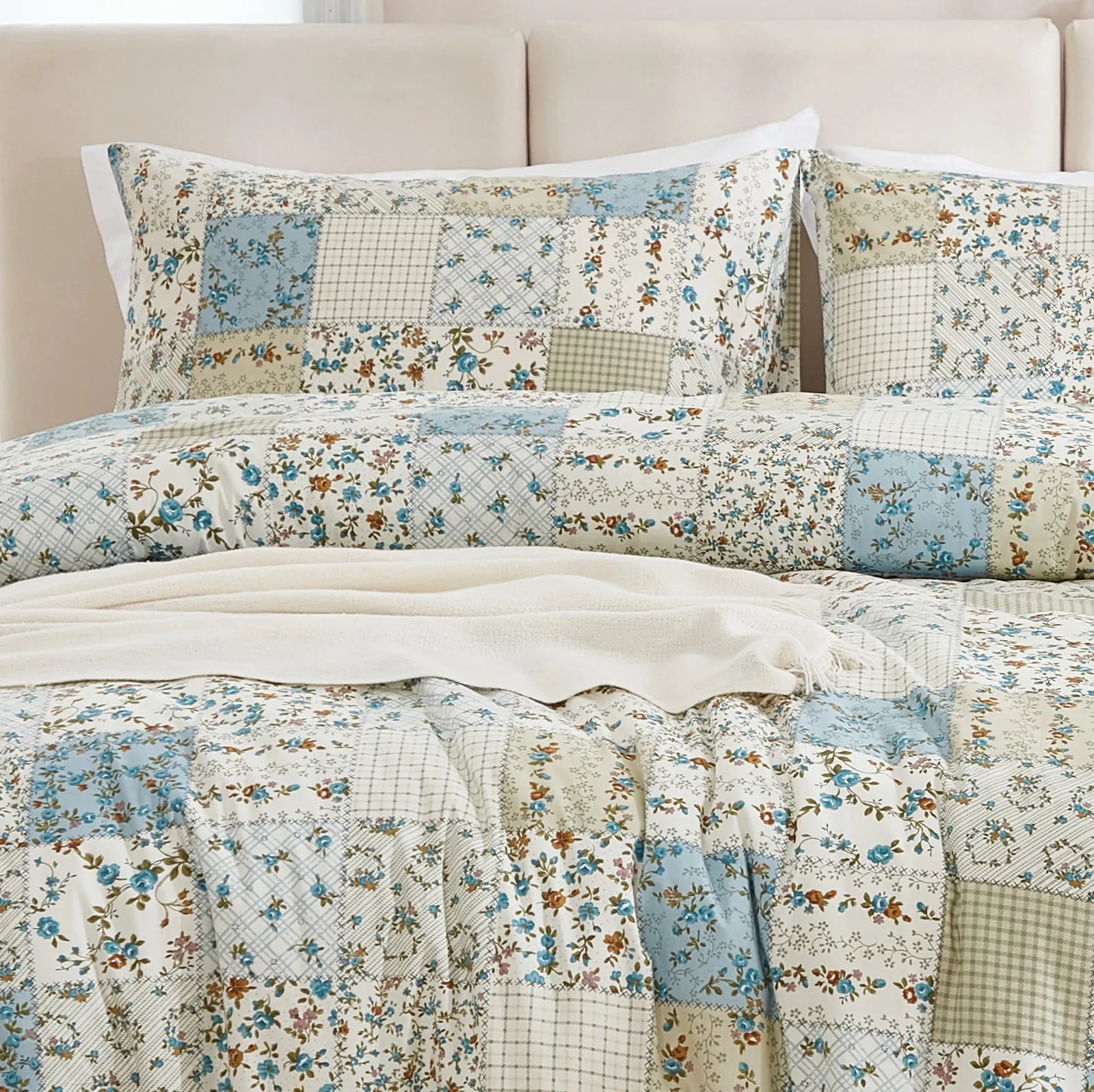 A detailed shot of the woven cotton fabric and intricate patchwork design