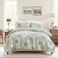 Full shot of the green patchwork duvet cover set with matching pillowcases