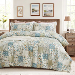The green patchwork duvet cover set styled on a bed in a modern, neutral-toned room