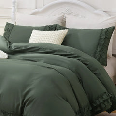 Close-up shot of the ruffled edge on the corner of the green comforter set