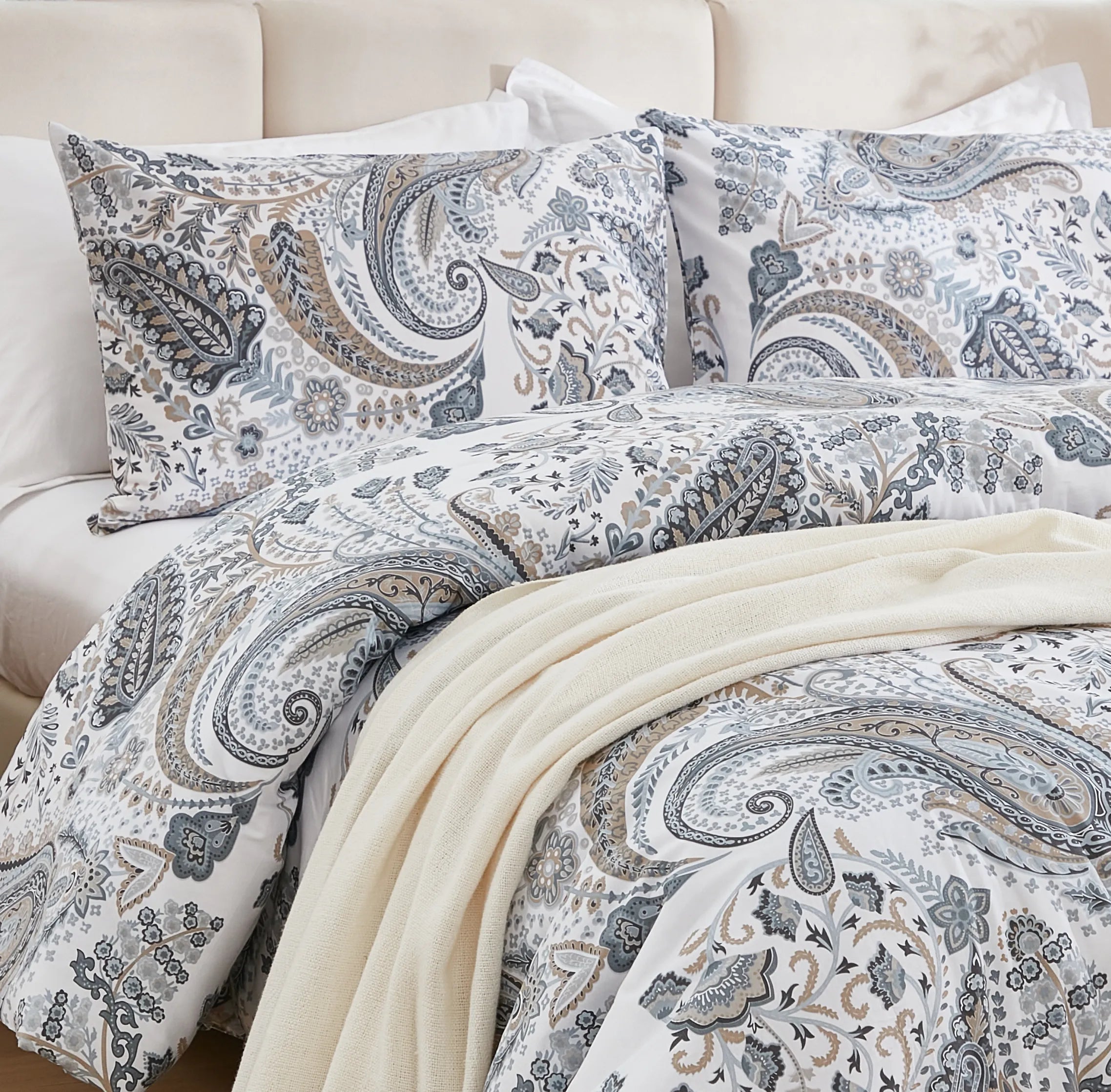 close-up of the grey paisley pattern on the comforter set