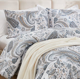 close-up of the grey paisley pattern on the comforter set