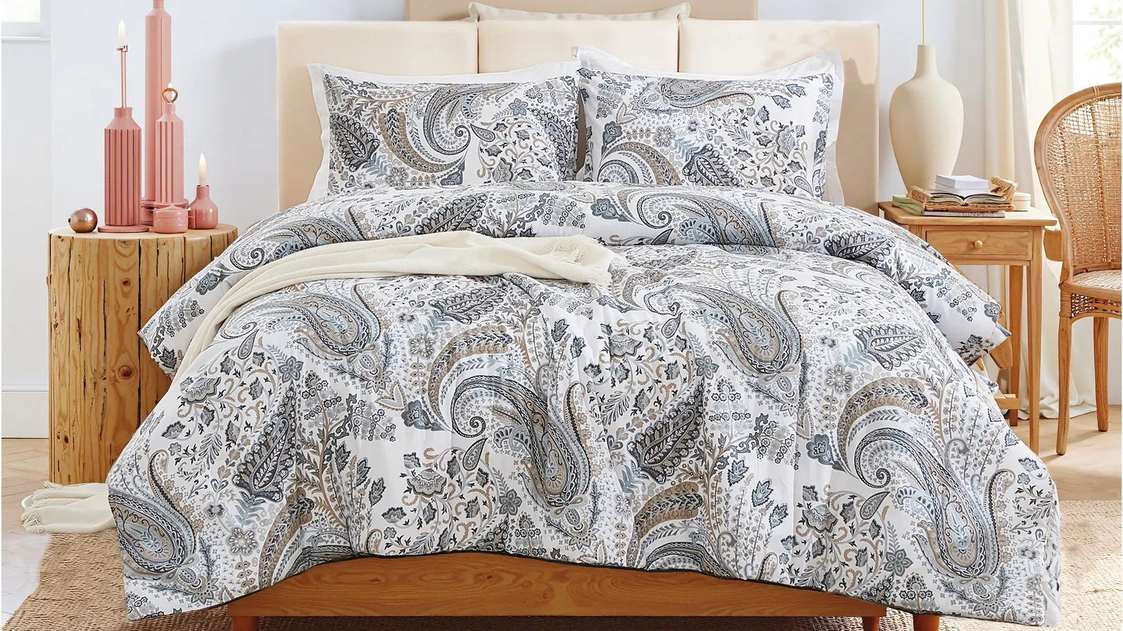 the grey paisley comforter set styled on a bed in a modern bedroom