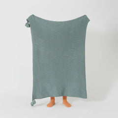 Person Holding Up Aqua Knitted Throw Blanket Full Length Display