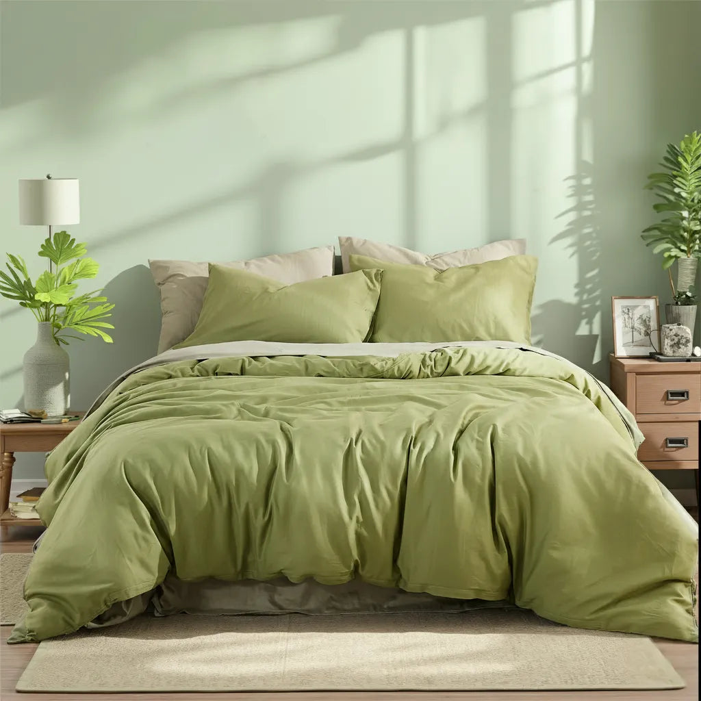 Symmetric bedroom layout featuring a matcha green solid cotton duvet set between two wooden nightstands with lamps and plants.