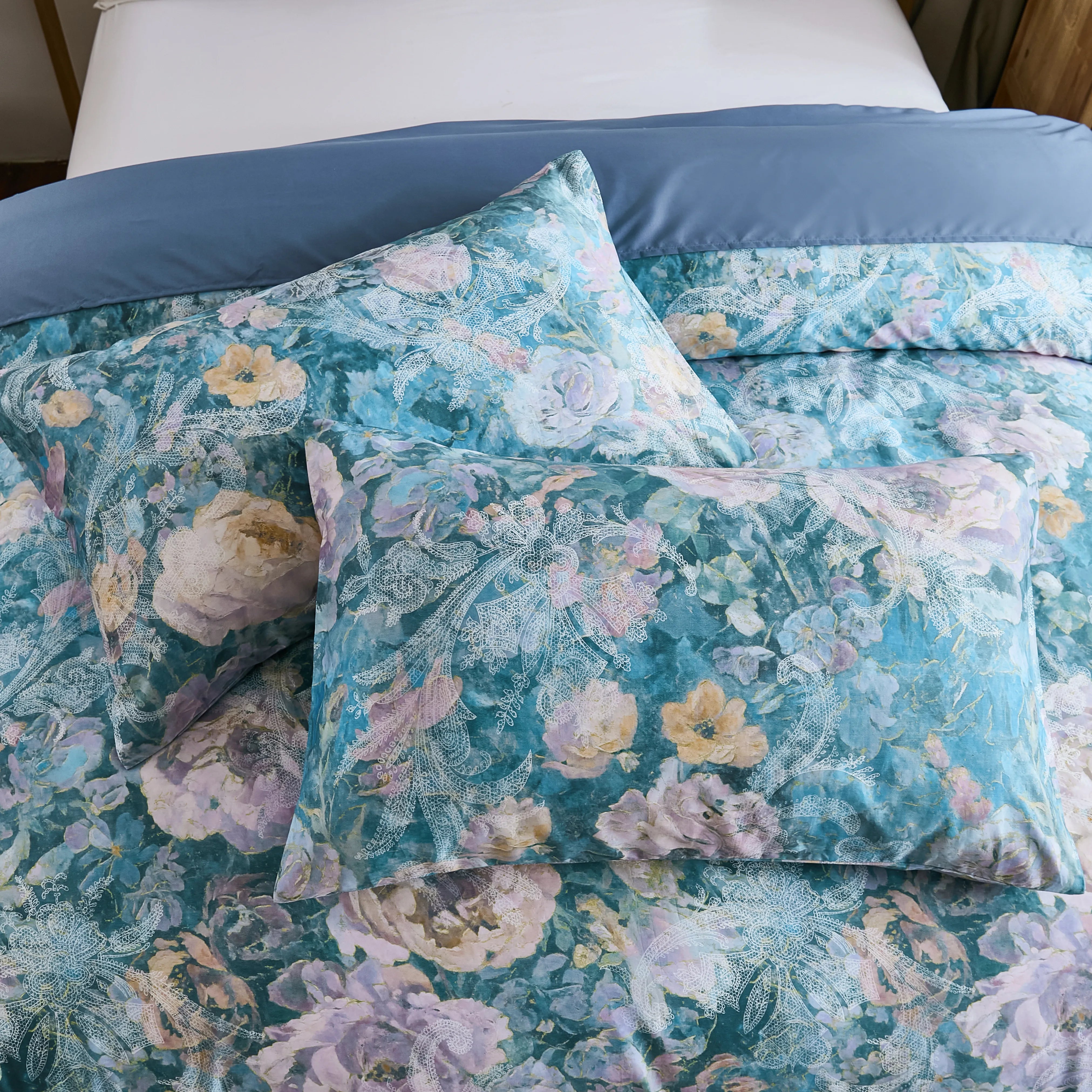 Detailed view of the comforter set showing the matching pillows