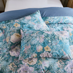 Detailed view of the comforter set showing the matching pillows
