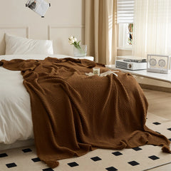 Mocha Knitted Throw Blanket Draped on Bed Showing Natural Fall