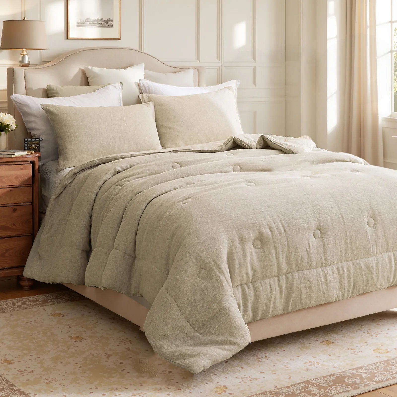 Side view of natural linen pillowcases placed on a bed with a beige comforter