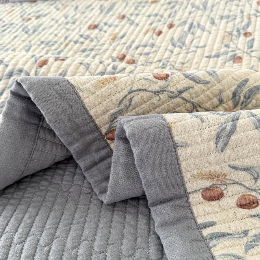 orchard flora washed cotton linen quilt slate blue solid reverse border detail