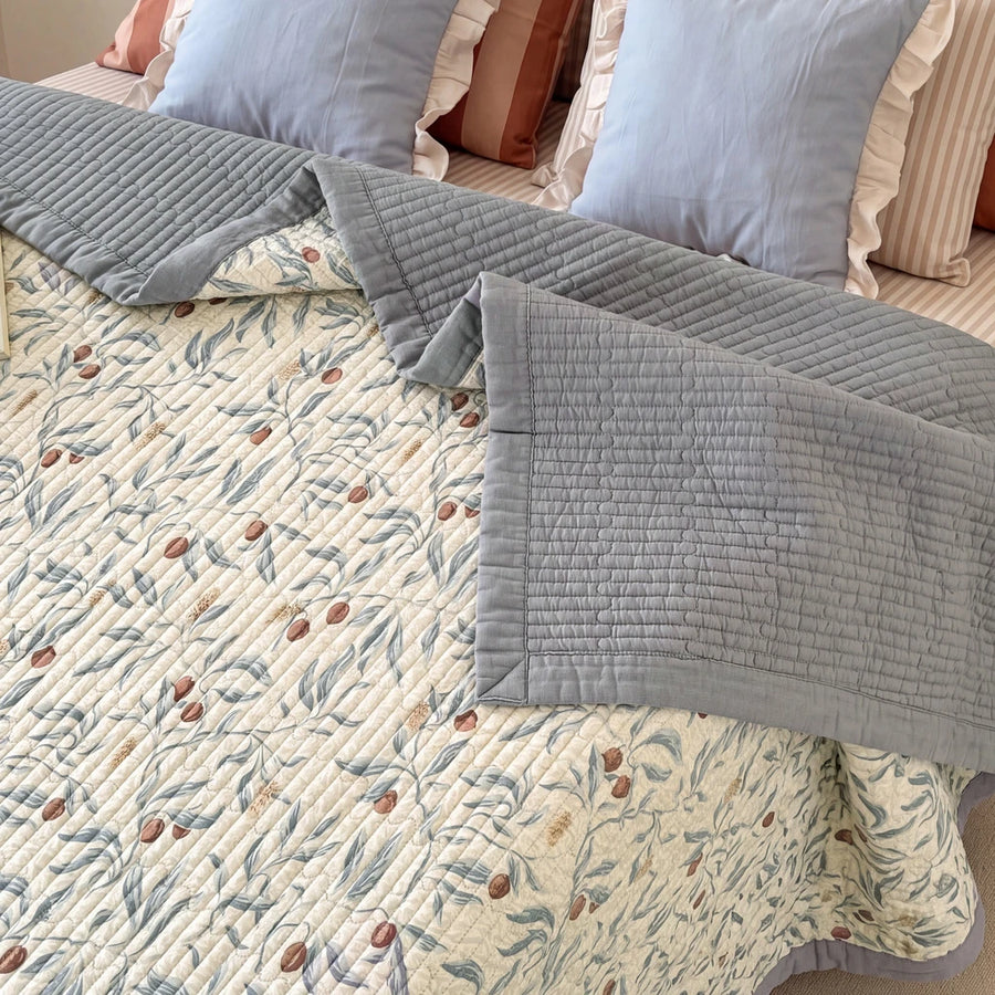 orchard flora washed cotton linen quilt slate blue solid reverse olive leaf print detail