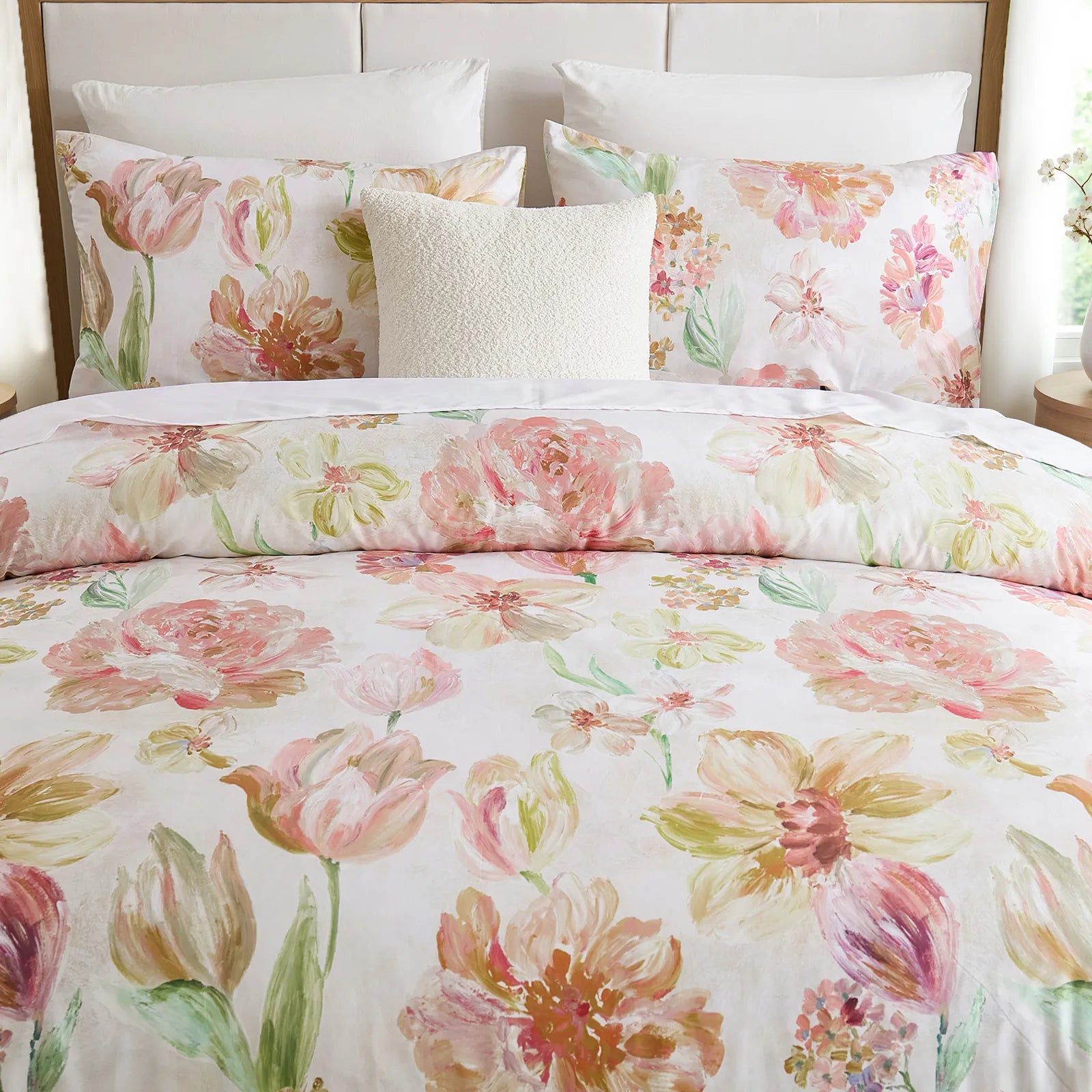 Detail of the pink floral pillows and decorative pillow