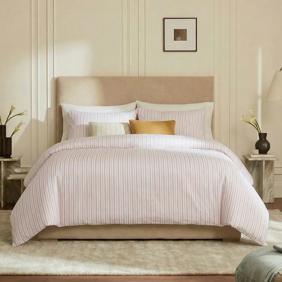 Full front view of pink and white striped bedding set