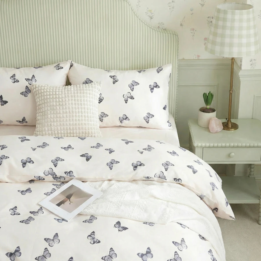 premium cotton butterfly quilt cover with puffy cushion detail styled in bright bedroom