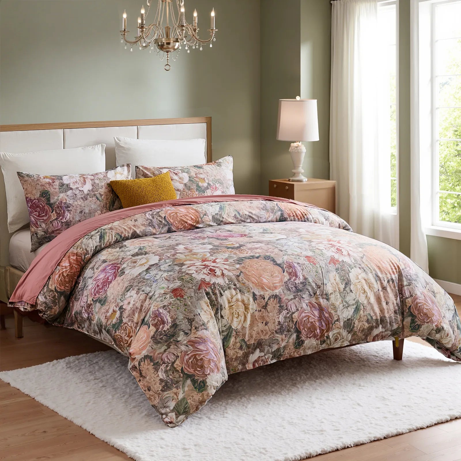 Side view of the retro bloom comforter set with pillows and a folded quilt