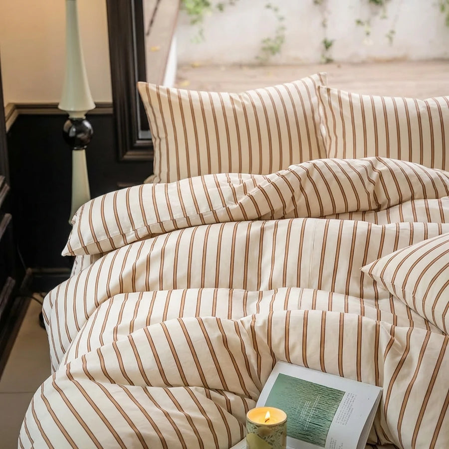 scandinavian tan striped bedding bedroom interior