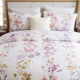 Front view detail of the comforter set with a decorative pillow