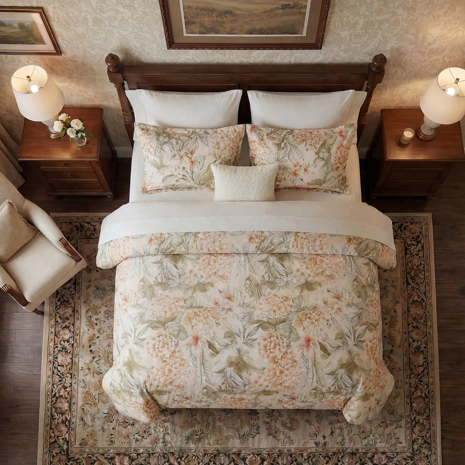 Top down view of floral print comforter and matching pillows